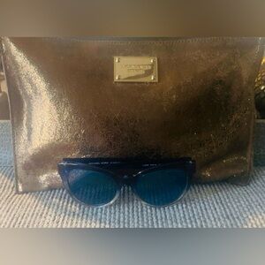 Michael Kors Gold Bag with Blue Sunglasses